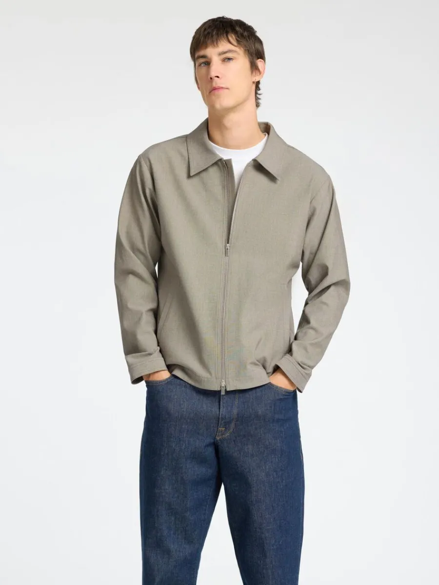 blixtlsfrsedd_jacka_0.webp SELECTED BLIXTLÅSFÖRSEDD JACKA Beige Clearance