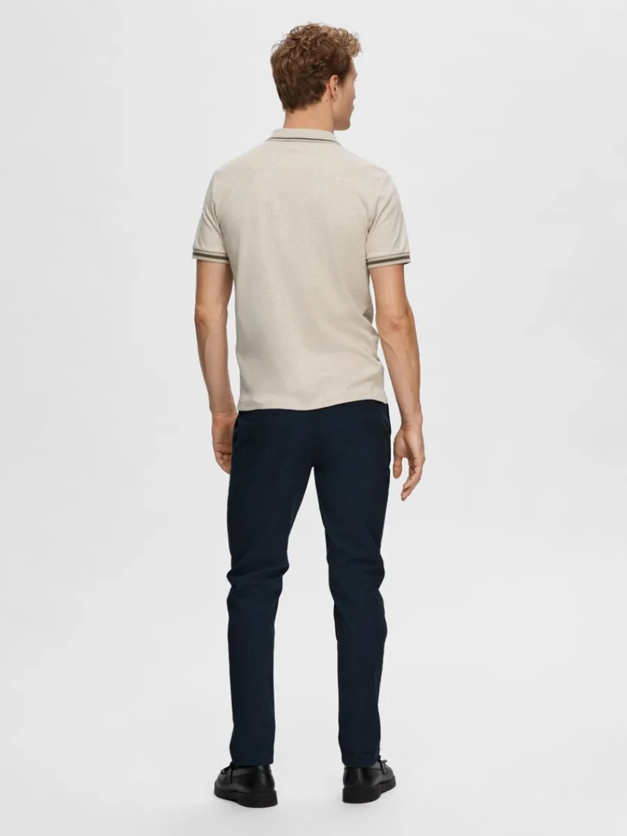 blixtlsfrsedd_piktrja_5-3.webp SELECTED BLIXTLÅSFÖRSEDD PIKÉTRÖJA Beige Shop