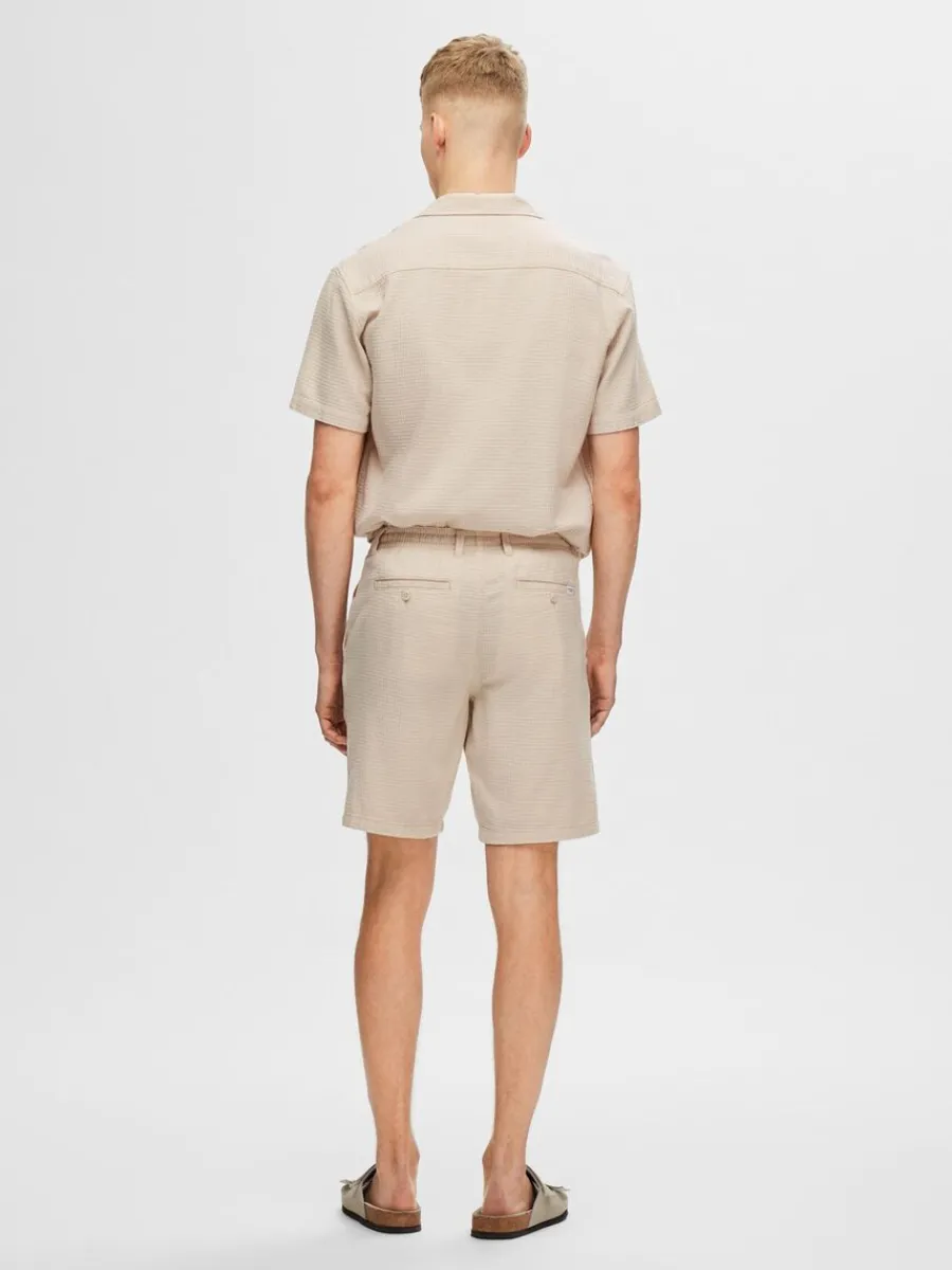 bomullssydd_shorts_1-2.webp SELECTED BOMULLSSYDD SHORTS Beige Shop