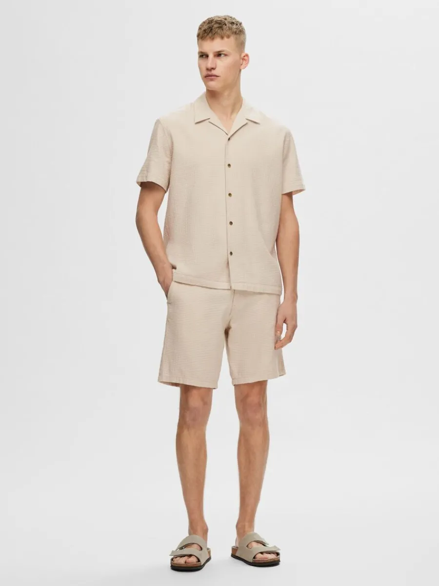 bomullssydd_shorts_2-2.webp SELECTED BOMULLSSYDD SHORTS Beige Shop