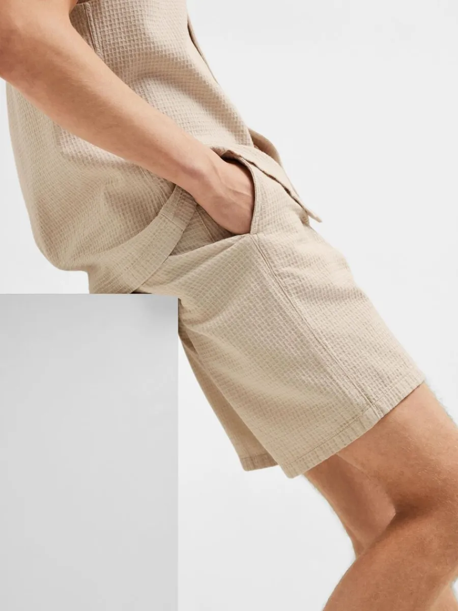 bomullssydd_shorts_3-2.webp SELECTED BOMULLSSYDD SHORTS Beige Shop