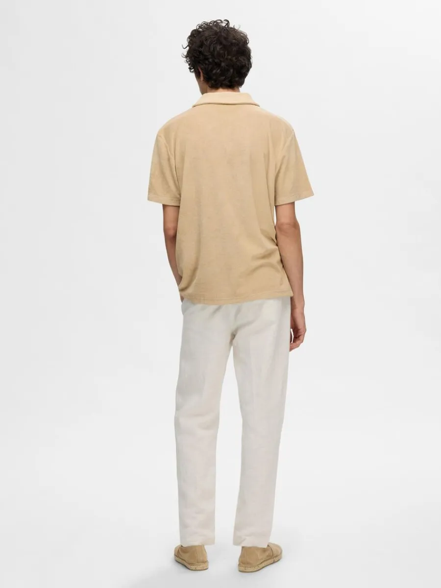 frotttyg_piktrja_5-1.webp SELECTED FROTTÉTYG PIKÉTRÖJA Beige Shop
