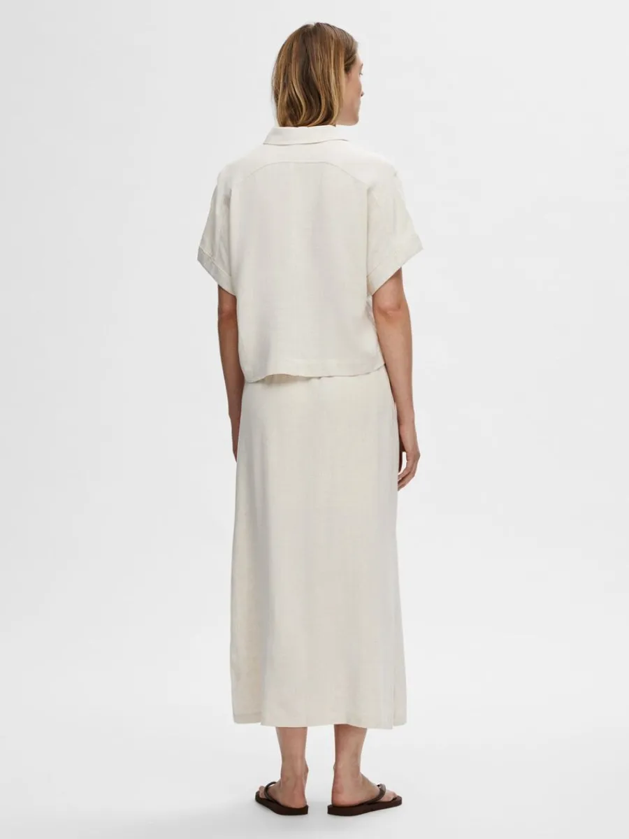 hg_midja_maxikjol_5-1.webp SELECTED HÖG MIDJA MAXIKJOL Beige Shop