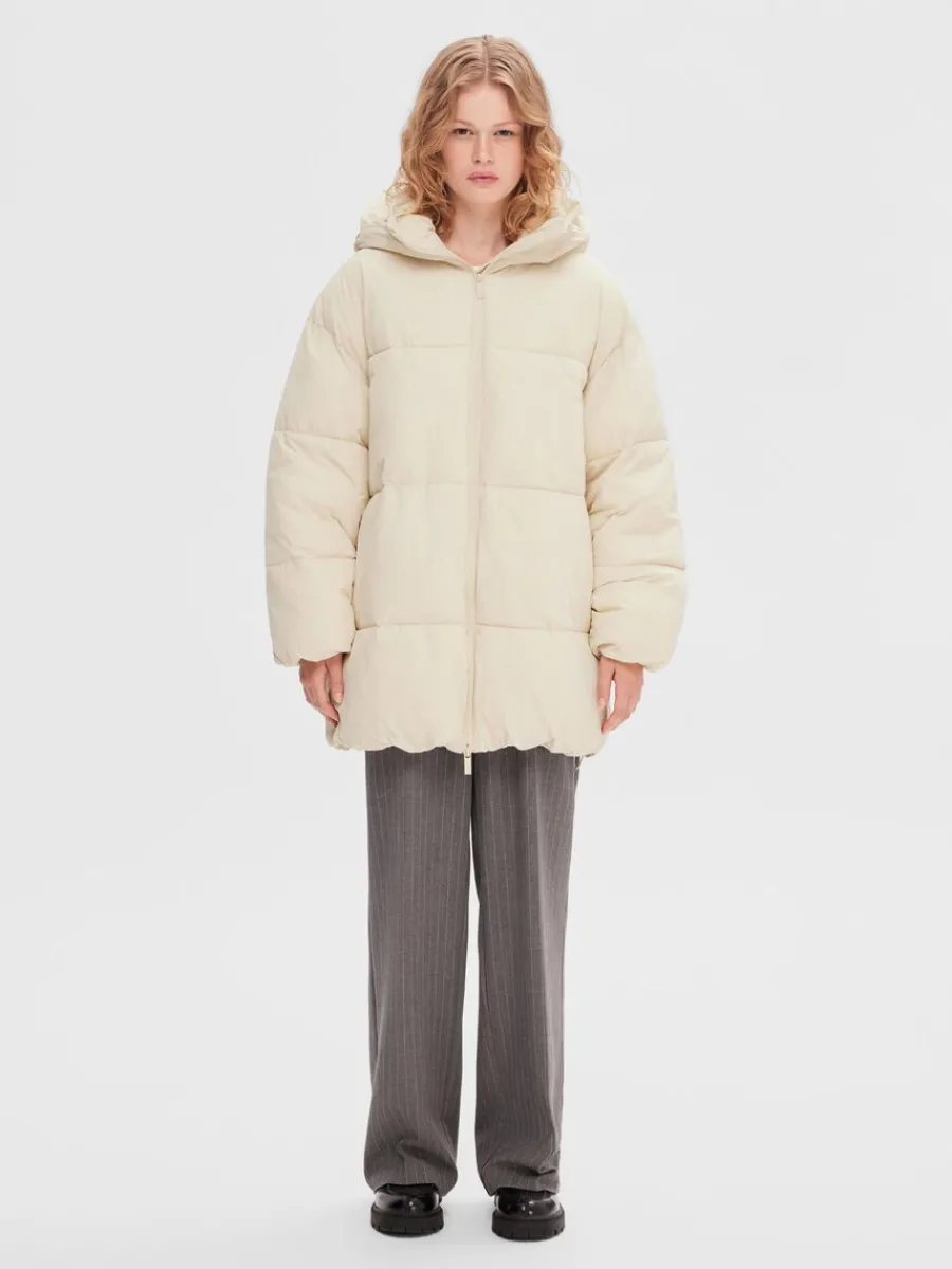 justerbar_pufferjacka_1.webp SELECTED JUSTERBAR PUFFERJACKA Beige Clearance