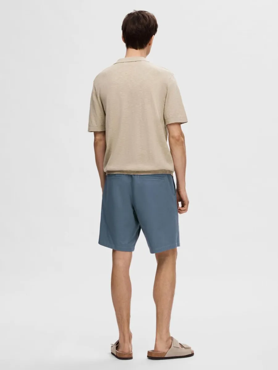 kortrmad_stickad_piktrja_5-1.webp SELECTED KORTÄRMAD STICKAD PIKÉTRÖJA Beige Store