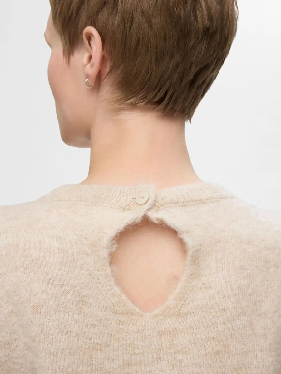 kortrmad_stickad_topp_2.webp SELECTED KORTÄRMAD STICKAD TOPP Beige Hot