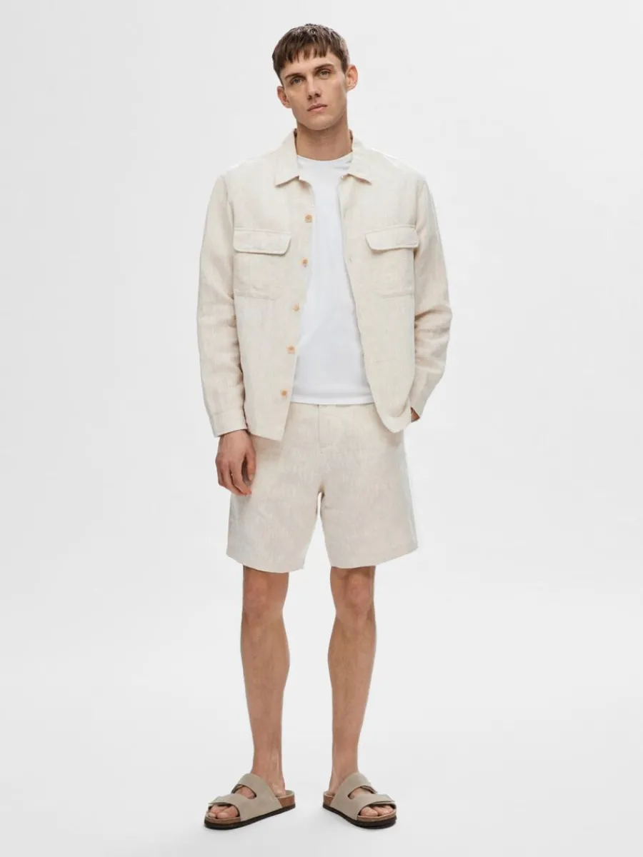 lngrmad_verskjorta_2-2.webp SELECTED LÅNGÄRMAD ÖVERSKJORTA Beige Hot