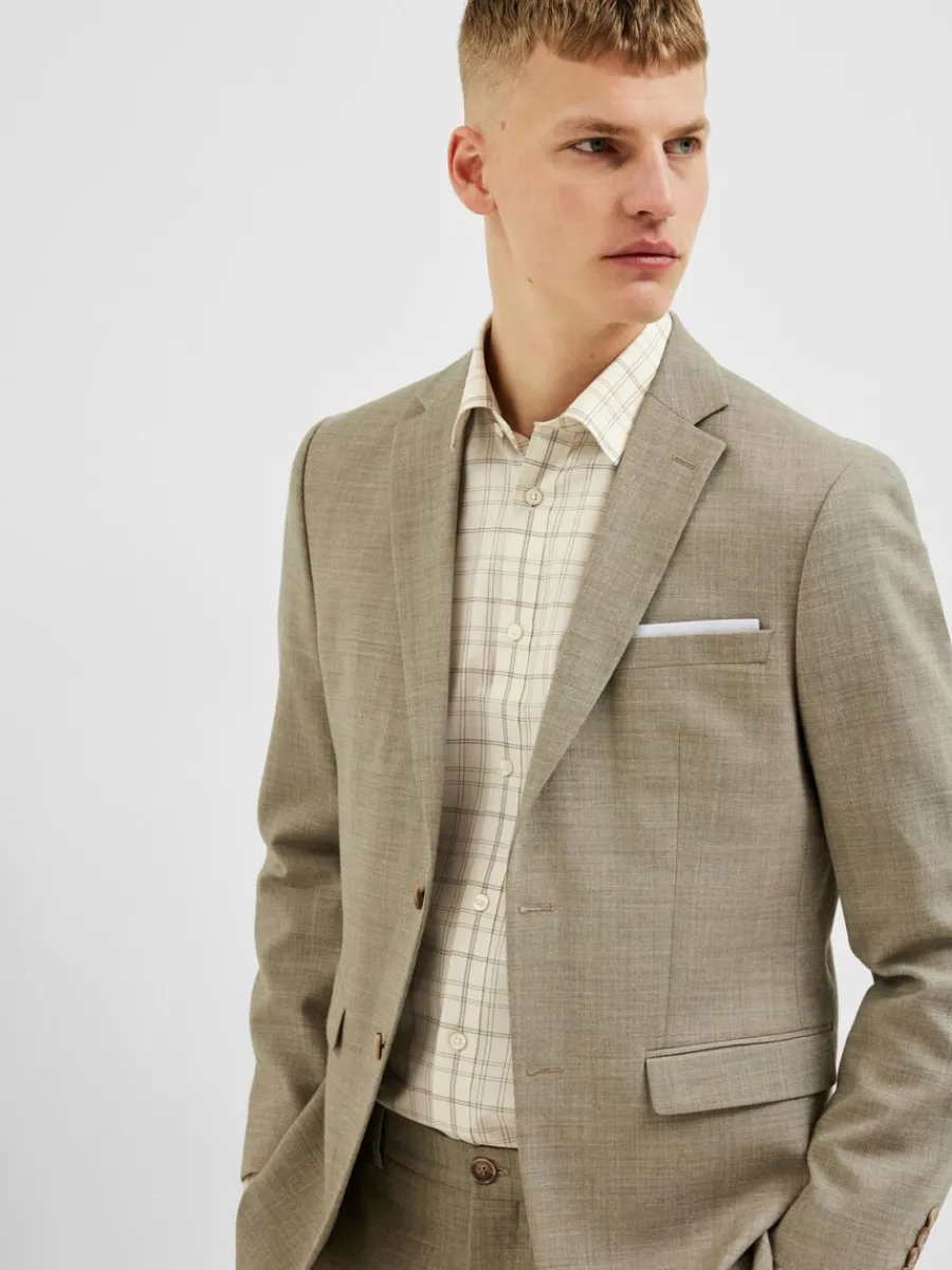 rutig_oinstoppad_lngrmad__3.webp SELECTED RUTIG OINSTOPPAD LÅNGÄRMAD SKJORTA Beige Store