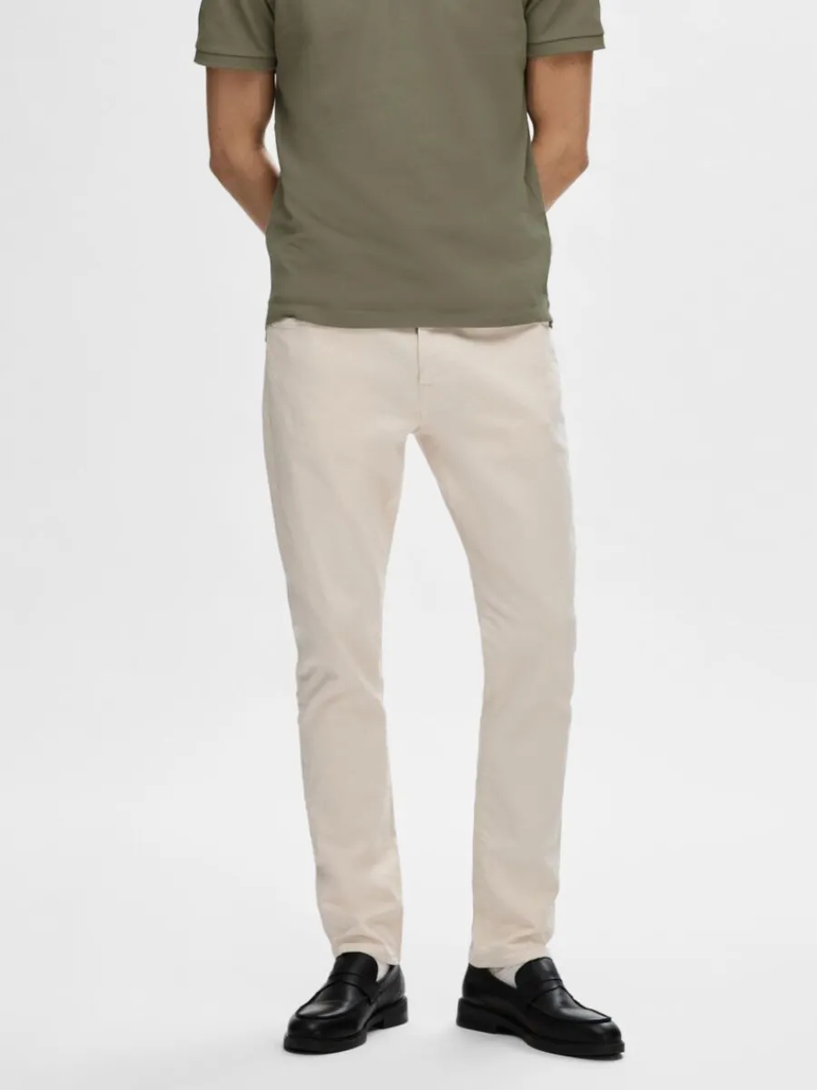 slim_fit_cream_jeans_0.webp SELECTED 175 SLIM FIT CREAM JEANS Beige Shop