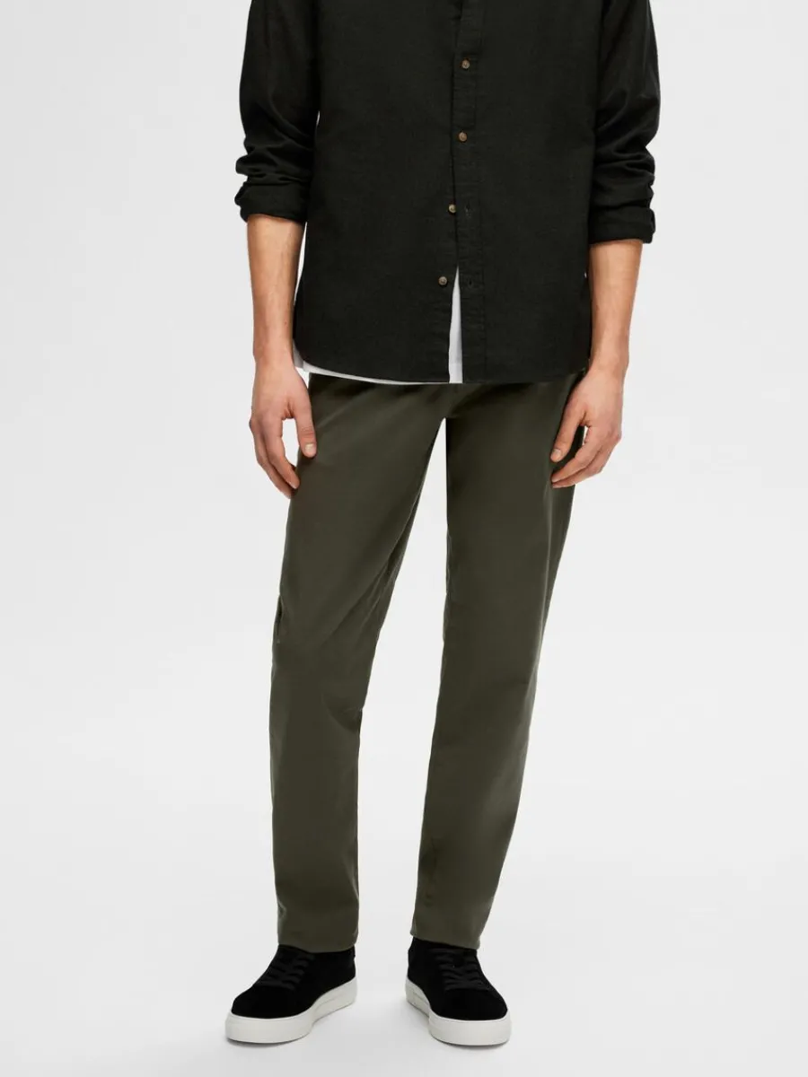 slim_fit_flex_chinos_0.webp SELECTED 175 SLIM FIT FLEX CHINOS Green Clearance