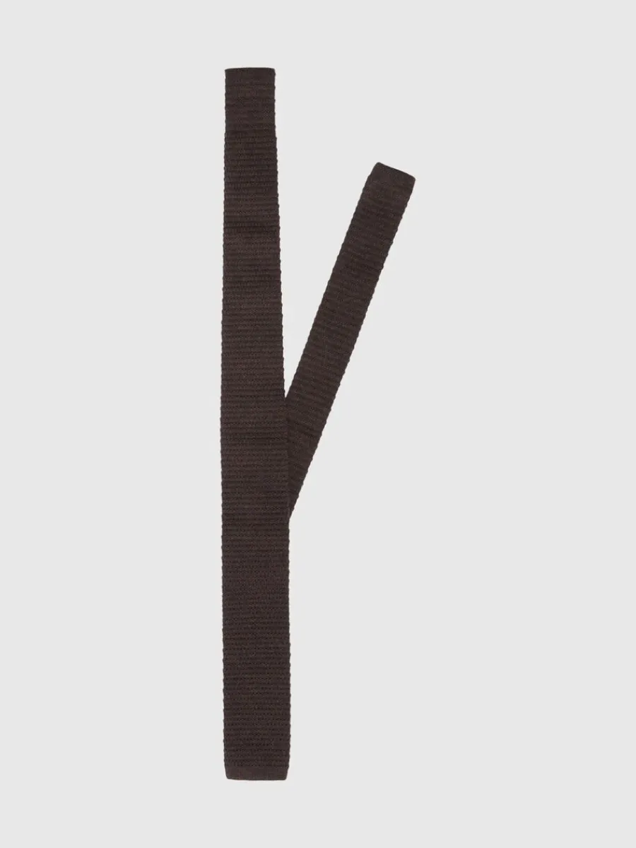 stickad_slips_0-1.webp SELECTED STICKAD SLIPS Brown Hot
